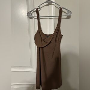 Short brown dress that holds the bust nicely with no bra